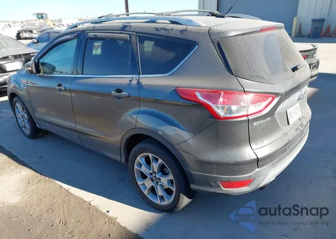 2015 Ford Escape Titanium z USA, uszkodzony, nr VIN 1FMCU9J90FUB86624